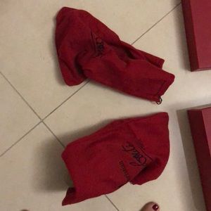 Brand new never worn with only dust bag no box